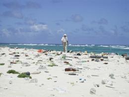Jean-Michel Cousteau walks the littered beaches of the Northwestern Hawaiian Islands