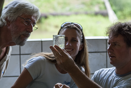 While on expedition in the Amazon, Jean-Michel Cousteau and Holly Lohuis learn all about sustainable, closed contained fish farms from Dr. Alexandre Honczaryk, researcher at National Institute for Amazonia Research.  Here Alex is showing Jean-Michel and Holly the eggs of a  prized Amazonian fish, tambaqui, a herbivore that has been easily overfished in much of the Amazon basin. Photo by Carrie Vonderhaar